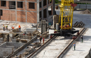 aerial view of construction worker in construction site aerial view of construction worker in construction site. High quality photo